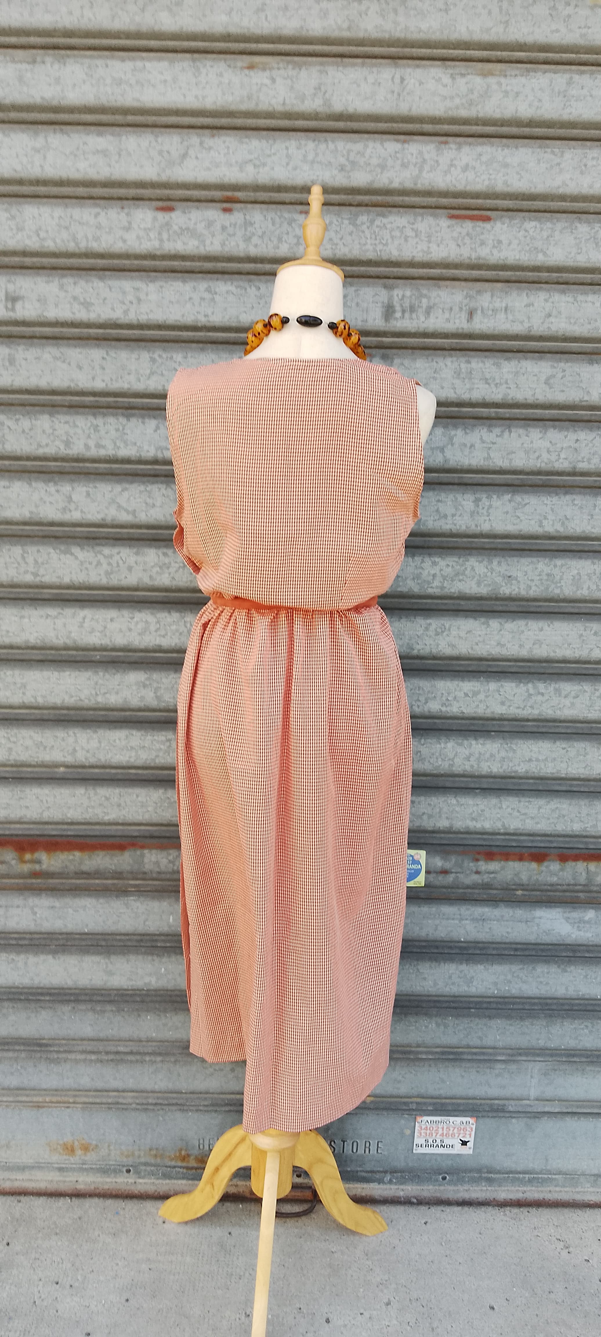 Vestito smanicato