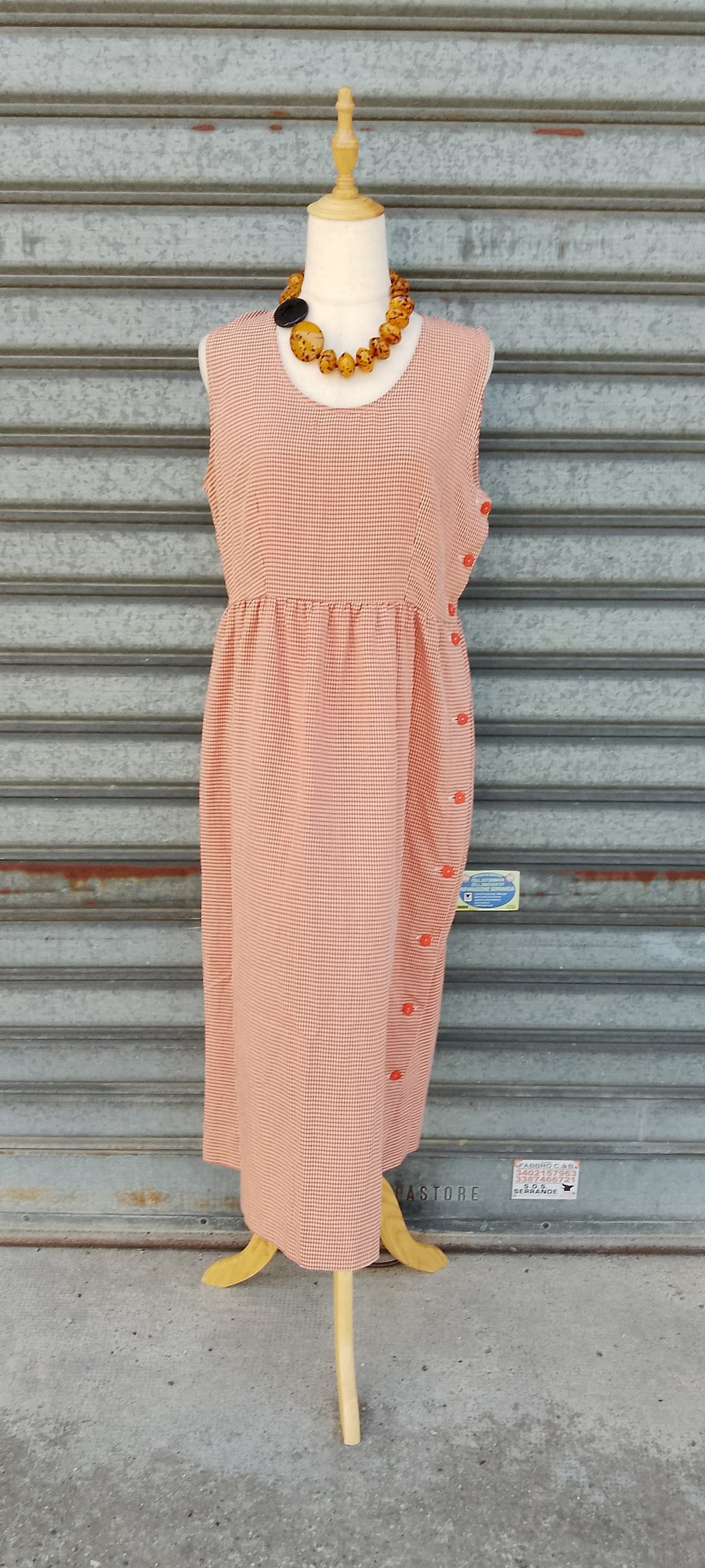 Vestito smanicato
